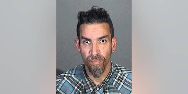This March 12, 2015 booking photo provided by the Glendale, Calif., Police Department shows Derick Ion Almena. Almena is an operator of the Ghost Ship warehouse in Oakland, in which dozens of people died in a fire that started Dec. 2, 2016. Spokeswoman Tawnee Lightfoot says Almena was stopped for driving with expired registration and, after a consensual search, two license plates from Oakland-area stolen cars were found. The charges apparently were not pursued. (Glendale Police Department via AP)