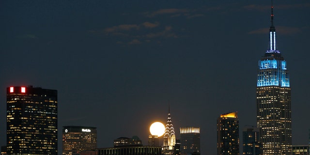 Feb. 7: A full moon rises between the Chrysler Building and the Empire State Building.