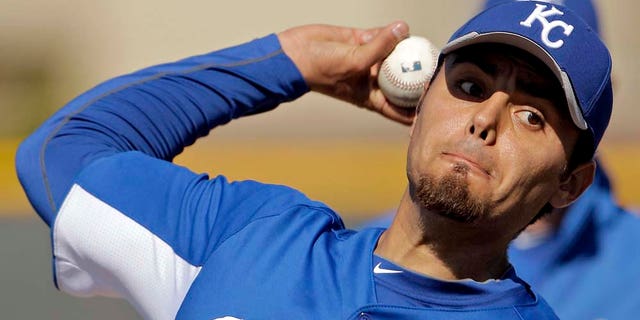 Kansas City Royals closer Joakim Soria throws during baseball spring training, Tuesday, Feb. 22, 2011, in Surprise, Ariz. (AP Photo/Charlie Riedel)