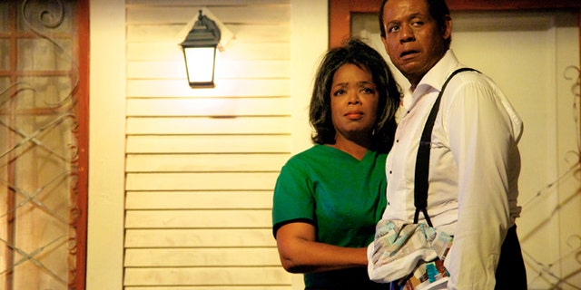 This film image released by The Weinstein Company shows Oprah Winfrey as Gloria Gaines, left, and Forest Whitaker as Cecil Gaines in a scene from Lee Daniels' "The Butler."