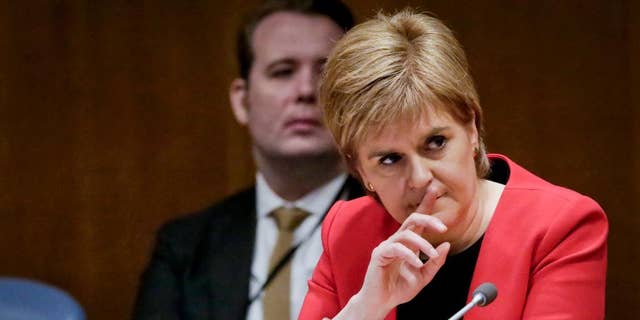 Scotland's First Minister Nicola Sturgeon listens after addressing a United Nations conference, Wednesday, April 5, 2017 at U.N. headquarters. (AP Photo/Bebeto Matthews)