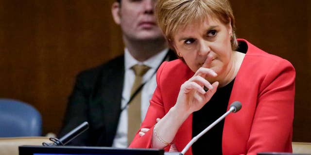 Scotland's First Minister Nicola Sturgeon listens after addressing a United Nations conference, Wednesday, April 5, 2017 at U.N. headquarters. (AP Photo/Bebeto Matthews)