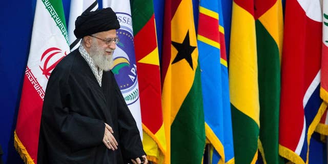 Iran's supreme leader Ayatollah Ali Khamenei arrives to a conference titled "International Conference in Support of Palestinian Intifada," in Tehran, Iran, Tuesday, Feb. 21, 2017. Iran's supreme leader has used the podium of the pro-Palestinian gathering in Tehran to call Israel a "fake" nation and a "dirty chapter" of history. (AP Photo/Ebrahim Noroozi)