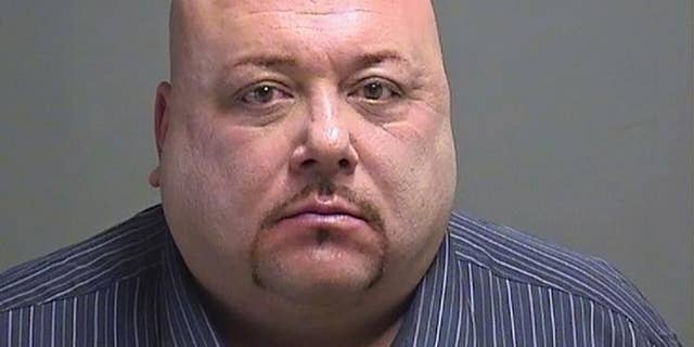 FILE - This undated photo file provided by the Mahoning County Sheriff's Office in Youngstown, Ohio, shows Robert Seman Jr., charged with setting a fire that killed a 10-year-old girl he was accused of raping and her grandparents. Seman killed himself Monday, April 10, 2017, the day before a scheduled trial in his potential death penalty case. (Mahoning County Sheriff's Office via AP)