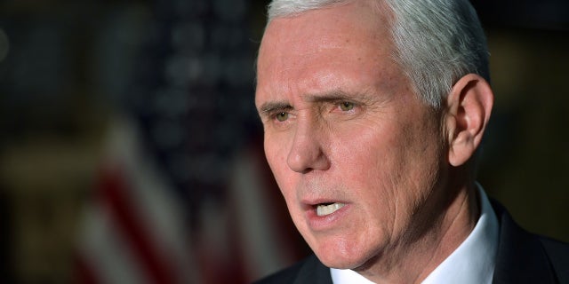 FILE -- Vice President Mike Pence speaks to reporters at Bagram Air Field in Afghanistan on December 22, 2017.