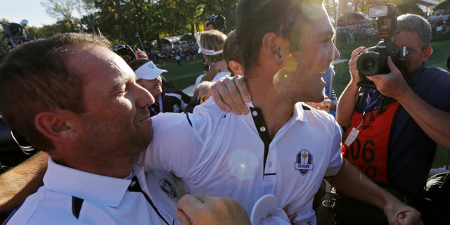 Sept. 30, 2012: Europe's Martin Kaymer celebrates with Sergio Garcia after winning the Ryder Cup PGA golf tournament at the Medinah Country Club in Medinah, Ill.