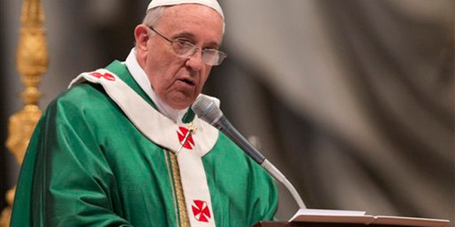 Pope Francis delivers his speech in the St. Peter's Basilica at the Vatican, Sunday, Feb. 23, 2014. Pope Francis has given a sort of code of conduct to new cardinals, the select group of churchmen who advise him, help shape policy and elect new pontiffs. The pontiff on Sunday told the 19 men he elevated to cardinals' rank a day earlier to avoid behaving like they were in a royal court. Francis' commandments for the cardinals? "No intrigue, gossip, power pacts, favoritism or preferentialism." (AP Photo/Alessandra Tarantino)