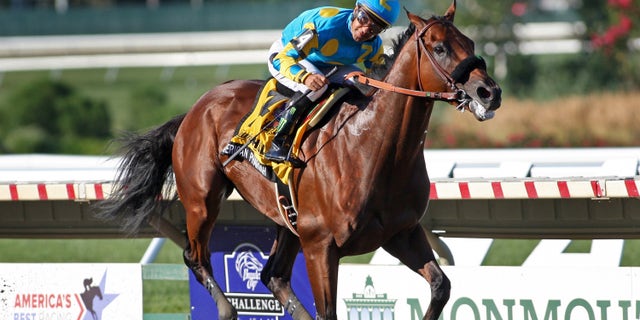 American Pharoah #4 with Victor Espinoza riding, won the $1,750,000 Grade 1 William Hill Haskell Invitational at Monmouth Park in Oceanport, New Jersey on Sunday, Aug. 2, 2015. (Mark Wyville/EQUI-PHOTO via AP)