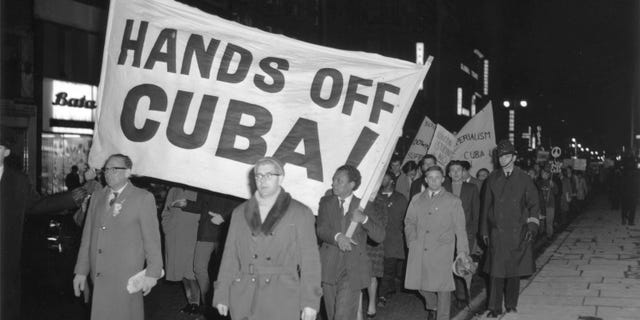 LONDON - OCTOBER 28, 1962: (EDITORIAL USE ONLY) (FILE PHOTO) Members of the Campaign for Nuclear Disarmament (CND) march during a protest against the U.S.'s action over the Cuban missile crisis October 28, 1962 in London, United Kingdom. Former Russian and U.S. officials attending a conference commemorating the 40th anniversary of the missile crisis October 2002 in Cuba said that the world was closer to a nuclear conflict during the 1962 standoff between Cuba and the U.S., than governments were aware of. (Photo by Getty Images)