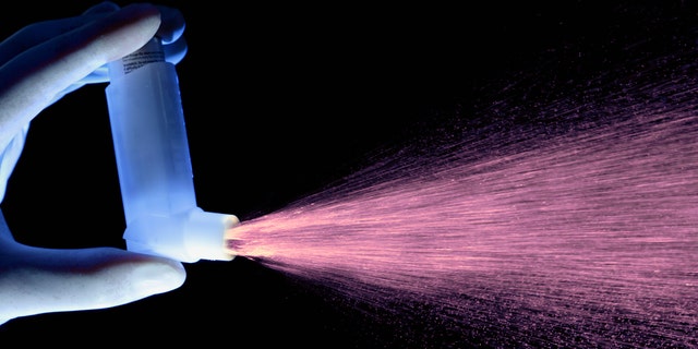 UNDATED: In this undated image an asthma inhaler is seen dispensing a dose of drug. A report released on May 3, 2005 to mark World Asthma Day claims that one person dies from asthma every hour in Western Europe. (Photo by Getty Images)