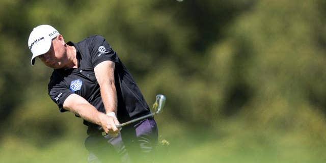 Graeme Storm of England in action at hole 12 during the third round of the Omega European Masters Golf Tournament in Crans-Montana, Switzerland, Saturday, Sept. 6, 2014. (AP Photo/Keystone/Ennio Leanza)