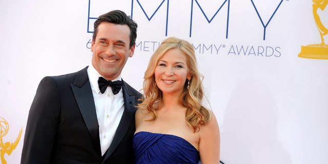 Sept. 23, 2012: Jon Hamm, left and Jennifer Westfeldt arrive at the 64th Primetime Emmy Awards at the Nokia Theatre in Los Angeles.