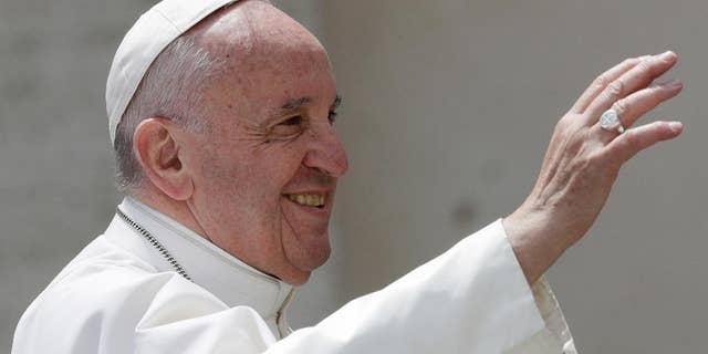 Pope Francis salutes at the end of his weekly general audience in St. Peter square at the Vatican, Wednesday, April 26, 2017. (AP Photo/Andrew Medichini)