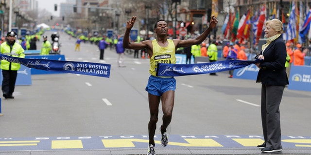 April 20, 2015: Lelisa Desisa, of Ethiopia, crosses the finish line to win the Boston Marathon in Boston.