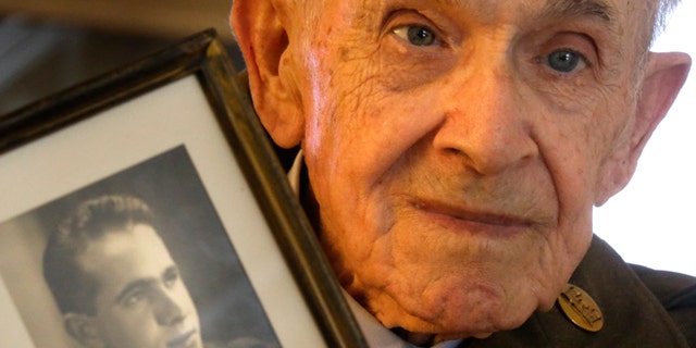 June 4, 2014: Eighty-nine-year-old Roland Chaisson, who stormed Normandy on D-Day when Germans killed half his squad before they could reach shore, poses for photographs in his home in Metairie, La. Chaisson is among D-Day veterans who will describe that day Friday and Saturday at the National World War II Museum.