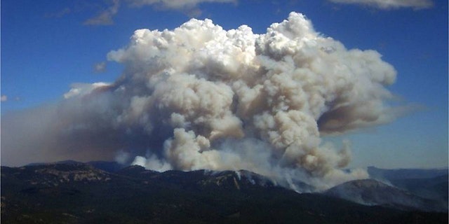 Smoke rises from the Moonlight fire, which burned in Plumas and Lassen counties in California for 22 days in September 2007.
