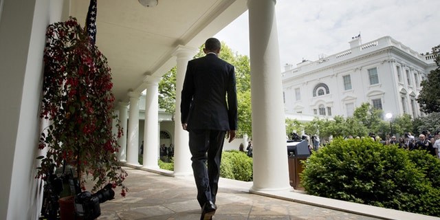 May 5, 2015: President Obama walks to the Rose Garden of the White House in Washington.