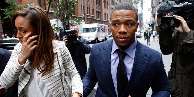 FILE - Nov. 5, 2014: Ray Rice arrives with his wife Janay Palmer for an appeal hearing of his indefinite suspension from the NFL in New York. A former FBI director hired to look into how the NFL pursued evidence in the Ray Rice abuse case says the league should have investigated the incident more thoroughly before it initially punished the player. Robert Mueller released the report Thursday, Jan. 8, 2015, saying that the NFL had substantial information about the case and could have obtained more. (AP Photo/Jason DeCrow, File)