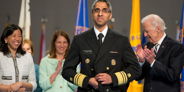 April 22, 2015: Alice Chen, left, Health and Human Services Secretary Sylvia Burwell, second from left, and Vice President Joe Biden, right, stand with U.S. Surgeon General Vivek Murthy, center, after he is ceremonially sworn-in in Conmy Hall at Fort Myer in Arlington, Va. Chen is the fiancé of Murthy.