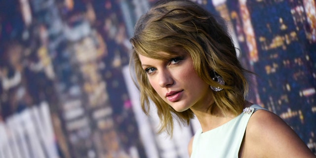 FILE - Feb. 15, 2015: Singer Taylor Swift attends the SNL 40th Anniversary Special in New York. Swift has donated $50,000 to the New York City public schools.