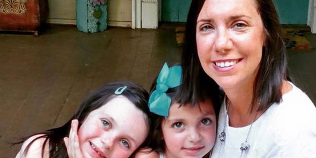 Stephanie Ballard is pictured with her two daughters, Riley, 6, and Reese, 4.