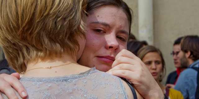 June 6, 2013: Unidentified students react in front of the Institut d'etudes Politiques, also known as Sciences Po.