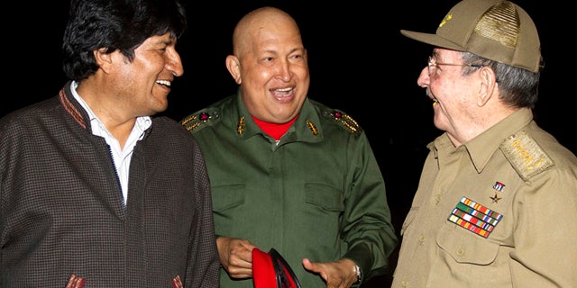 Sept. 18: In this picture released by the Agencia Boliviana de Informacion, Latin America leaders, from left, Bolivia's President Evo Morales, Hugo Chavez and Cuba's President Raul Castro speak at the Jose Marti airport in Havana, Cuba.