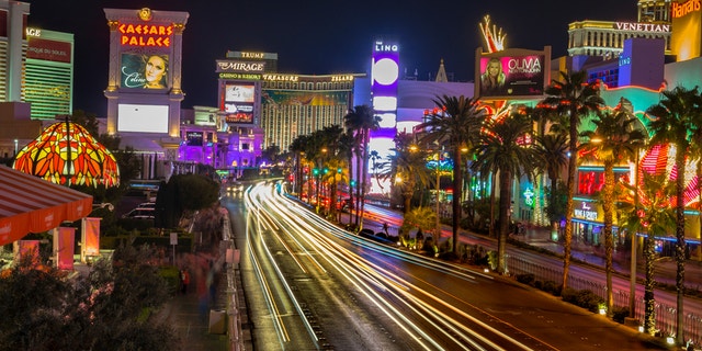 Las Vegas, USA - September 24,2015 - Photo taken at Las Vegas Boulevard. Caesars Palace, The Mirage are in this picture from Las Vegas, under a night sky. Photo taken at horizontal orientation. Many cars and people on the street.