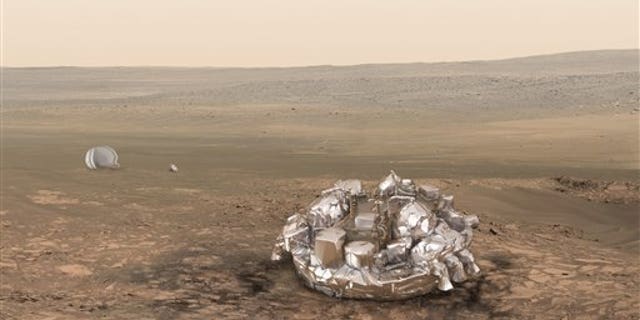 Artist impression of the Schiaparelli module on the surface of Mars provided by the European Space Agency, ESA.