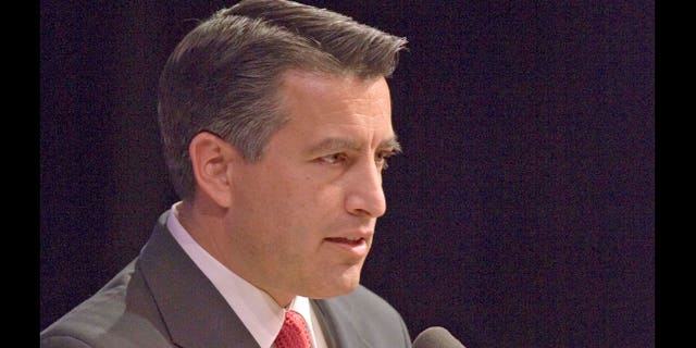 Gubernatorial candidate Brian Sandoval talks about Nevada issues during a debate with opponent Rory Reid Tuesday night, Oct 26, 2010 at Great Basin College Theater in Elko, Nev. Insults were traded and reputations questioned in a feisty debate Tuesday between Nevada gubernatorial candidates over the state's budget crisis, political ambitions and job experience as early voting winds down and Election Day looms. (AP Photo/Elko Daily Free Press, Ross Andreson).