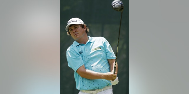 Jason Dufner watches his shot from the fifth tee during the third round of The Players championship golf tournament at TPC Sawgrass, Saturday, May 11, 2013, in Ponte Vedra Beach, Fla. (AP Photo/John Raoux)