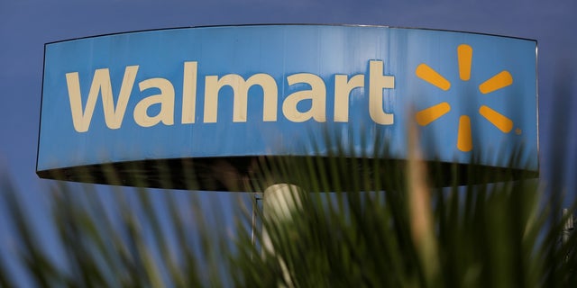 Walmart apologized for a sign over a gun display in an Indiana store.