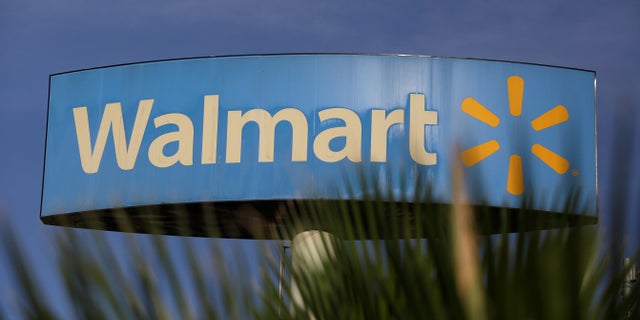 Walmart apologized for a sign over a gun display in an Indiana store.