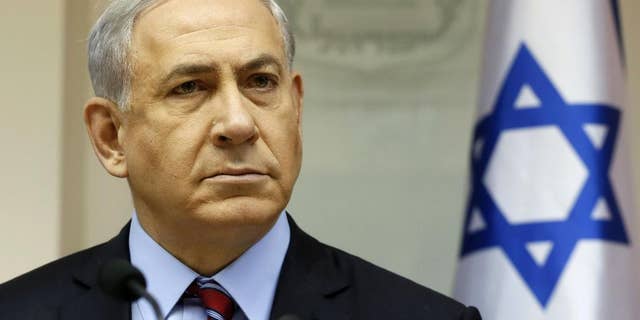 Israeli Prime Minister Benjamin Netanyahu chairs the weekly cabinet meeting at his Jerusalem office, Sunday, Nov. 16, 2014. (AP)