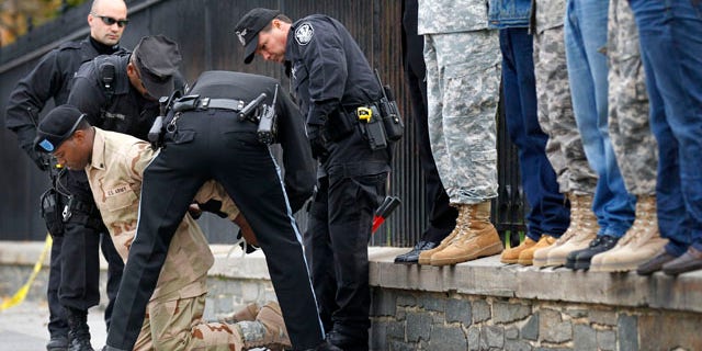 Nov. 15: U.S. Army Veteran Rob Smith is arrested for handcuffing himself to the fence outside the White House in Washington, D.C., during a protest for gay rights. Smith was part of a group demanding that President Obama make good on his promise to secure the repeal of "don't ask, don't tell."