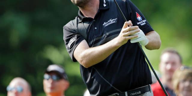 FILE - In this Aug. 2, 2014, file photo, Marc Leishman watches his drive on the third hole during the third round of the Bridgestone Invitational golf tournament at Firestone Country Club in Akron, Ohio. Lieshman, who has missed recent Tour events for family reasons, returns this week at the Zurich Classic in New Orleans. (AP Photo/Mark Duncan, File)
