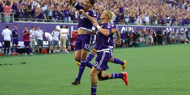 ORLANDO, FL - MARCH 08: Kaka #10 of Orlando City SC celebrates after he scores the first goal in team history during an MLS soccer match between the New York City FC and the Orlando City SC at the Orlando Citrus Bowl on March 8, 2015 in Orlando, Florida. This was the first game for both teams and the final score was 1-1.(Photo by Alex Menendez/Getty Images)