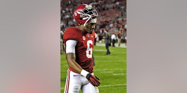 FILE - In this Sept. 21, 2013 file photo, Alabama defensive back Ha Ha Clinton-Dix (6) walks off the field after a win over Colorado State in an NCAA college football game in Tuscaloosa, Ala. Alabama coach Nick Saban suspended Clinton-Dix indefinitely for violating unspecified team rules. Saban announced the suspension of one of the top-ranked Crimson Tide's top defensive players after Wednesday's Oct. 2, 2013, practice. Saban wouldn't say what Clinton-Dix did wrong. (AP Photo/Butch Dill, File)