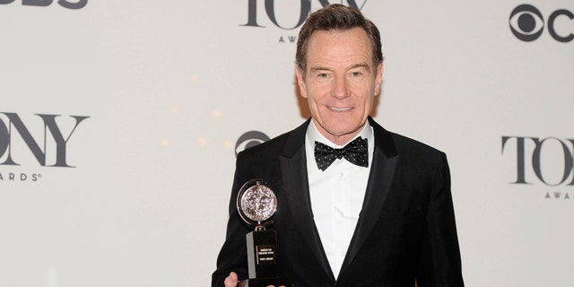 June 8, 2014: Bryan Cranston poses with his award for best actor in a play for 'All the Way' in the press room at the 68th annual Tony Awards at Radio City Music Hall in New York. (Photo by Charles Sykes/Invision/AP)