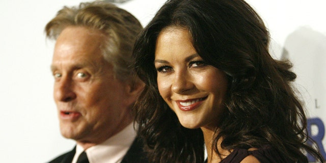 Michael Douglas, left, and wife Catherine Zeta-Jones, right, are completely on board with working together now that they're