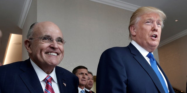Rudy Giuliani, shown here with President Trump in September 2016, is joining his legal team.