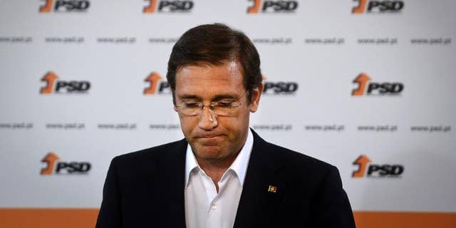 Portuguese Prime Minister Pedro Passos Coelho delivers a speech after the results of Portugal local elections in Lisbon, on September 29, 2013