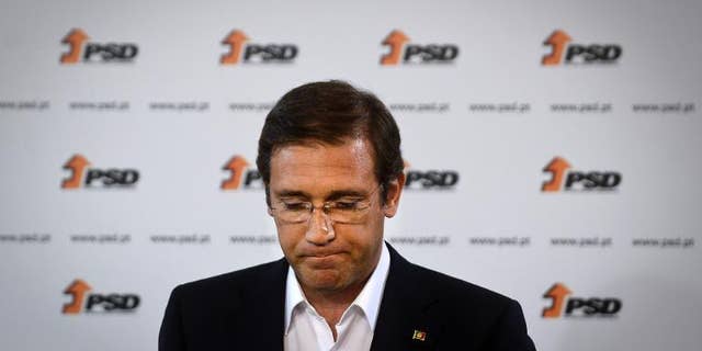 Portuguese Prime Minister Pedro Passos Coelho delivers a speech after the results of Portugal local elections in Lisbon, on September 29, 2013