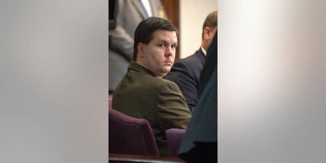 FILE- This Oct. 3, 2016, file photo shows Justin Ross Harris listening to jury selection during his trial at the Glynn County Courthouse in Brunswick, Ga. The trial of Harris, accused of intentionally leaving his toddler son in a hot SUV to die, is being put on hold as Hurricane Matthew heads toward the Georgia coast where he is being prosecuted. Multiple news outlets report a judge said the trial of Justin Ross Harris would be in recess Thursday and Friday and then resume Monday. (Stephen B. Morton/Atlanta Journal-Constitution via AP, Pool, File)