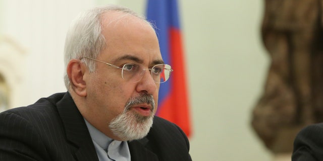 Iranian Foreign Minister Mohammad Javad Zarif speaks at his meeting with Russian President Vladimir Putin in the Kremlin in Moscow, Russia, Thursday, Jan. 16, 2014. Putin credited Tehran for the success of international talks on the Iranian nuclear program and called for boosting Russian-Iranian trade. (AP Photo/Sergei Karpukhin, Pool)