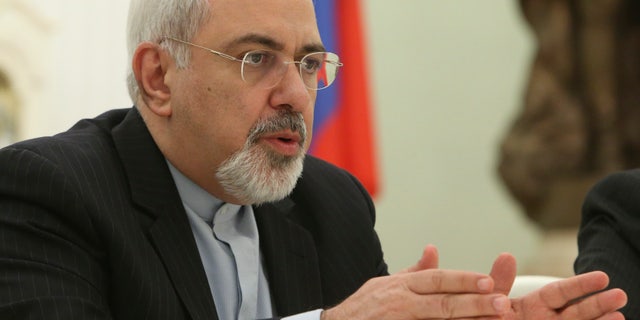 Iranian Foreign Minister Mohammad Javad Zarif speaks at his meeting with Russian President Vladimir Putin in the Kremlin in Moscow, Russia, Thursday, Jan. 16, 2014. Putin credited Tehran for the success of international talks on the Iranian nuclear program and called for boosting Russian-Iranian trade. (AP Photo/Sergei Karpukhin, Pool)