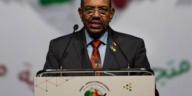 FILE - In this Oct. 29, 2015 file photo, Sudanese President Omar al-Bashir speaks in New Delhi, India. The Obama administration, which has negotiated new relationships with states like Cuba, Iran and Myanmar, is now eyeing a rapprochement with Sudan, a nation that has long been designated a state sponsor of terrorism and whose current leader has been indicted on war crimes charges. (AP Photo/Bernat Armangue, File)