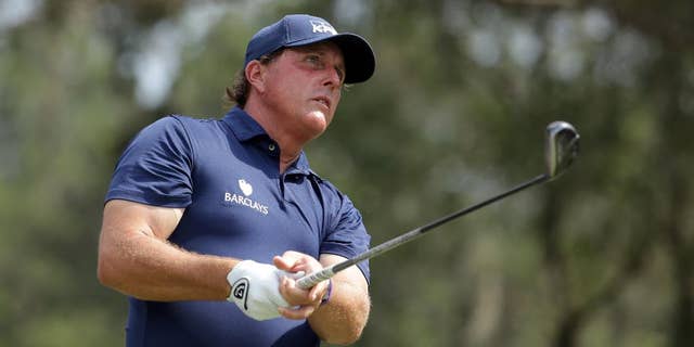 Phil Mickelson looks on during the second round of The Players Championship on May 13.