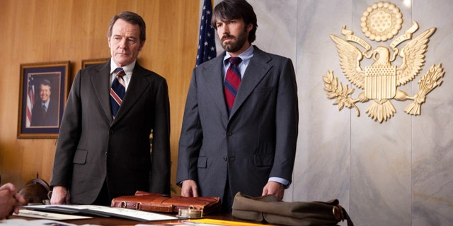 FILE - Photo released by Warner Bros. Pictures shows Bryan Cranston, left, as Jack O'Donnell and Ben Affleck as Tony Mendez in "Argo."