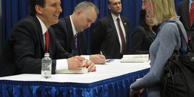 Former Minnesota Gov. Tim Pawlenty (R) signs books at the Conservative Political Action Conference Febuary 11. (Fox News Photo)